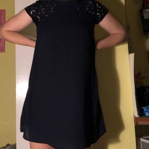 navy dress with lace on the shoulders